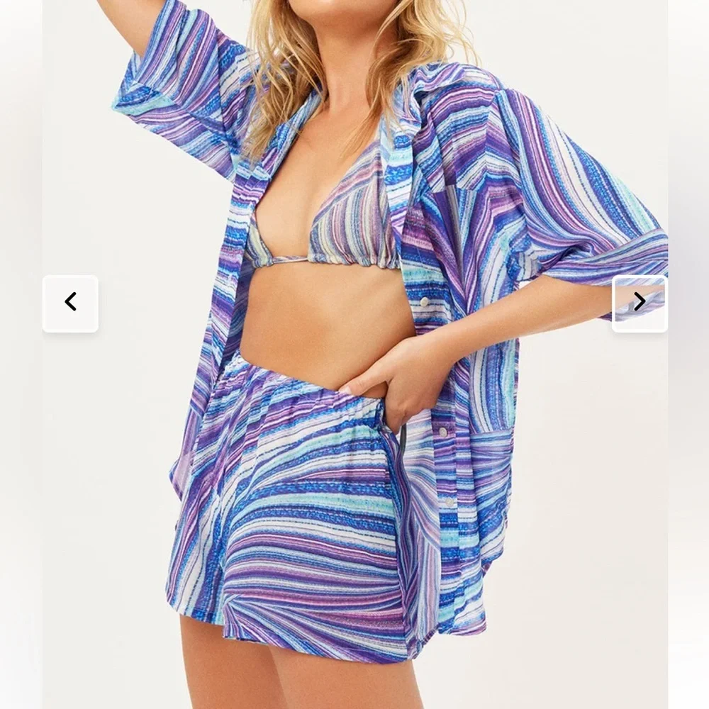 Frankie’s Bikinis Fifi Sustainable blue purple swirl cover up shirt. Size XS